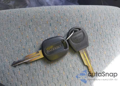 2004 Suzuki Forenza S из США, поврежденный, VIN KL5JD52Z44967910